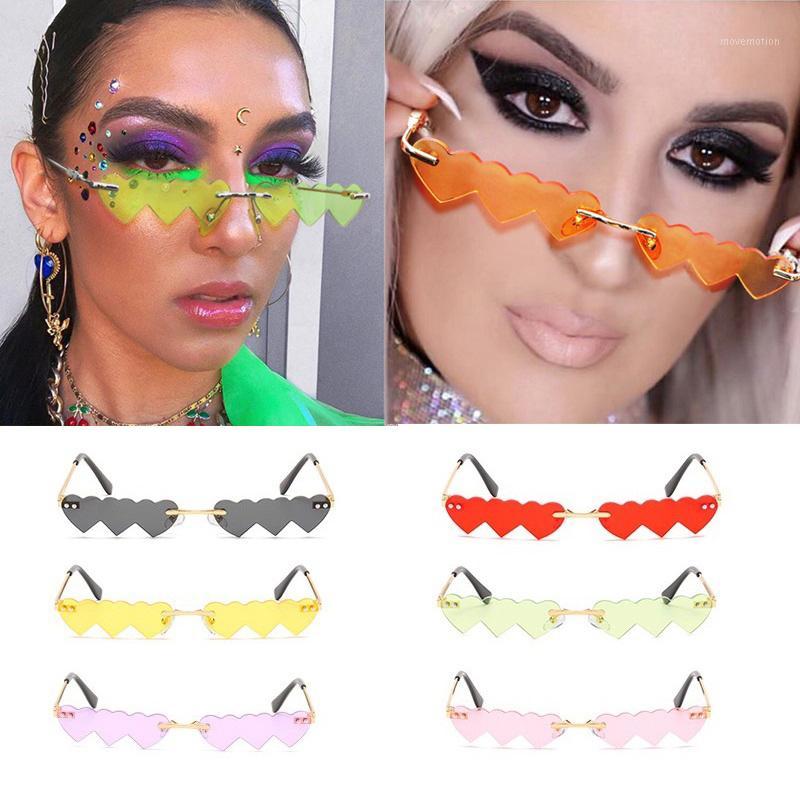Wholesale Unique Small Cute Heart Sunglasses For Women Sun Glasses Female Rimless Candy Color Hip Hop Shades Orange1
Wholesale Unique Small Cute Heart Sunglasses For Women Sun Glasses Female Rimless Candy Color Hip Hop Shades Orange1
