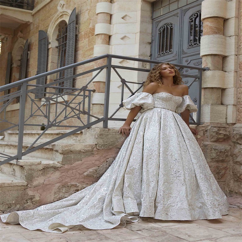 Luxury Wedding Dresses Sexy Sweetheart Bridal Gowns Bling Sequins Beads Appliqued Sweep Train Beach Custom Made Vestido De Novia