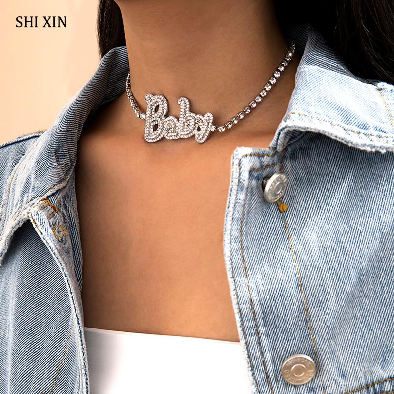 Chokers SHIXIN Iced Out Rhinestone Choker Necklace For Women Hip Hop Crystal Baby/Angel Letter Necklaces Girls Fashion Neck Jewelry 2021
Chokers SHIXIN Iced Out Rhinestone Choker Necklace For Women Hip Hop Crystal Baby/Angel Letter Necklaces Girls Fashion Neck Jewelry 2021