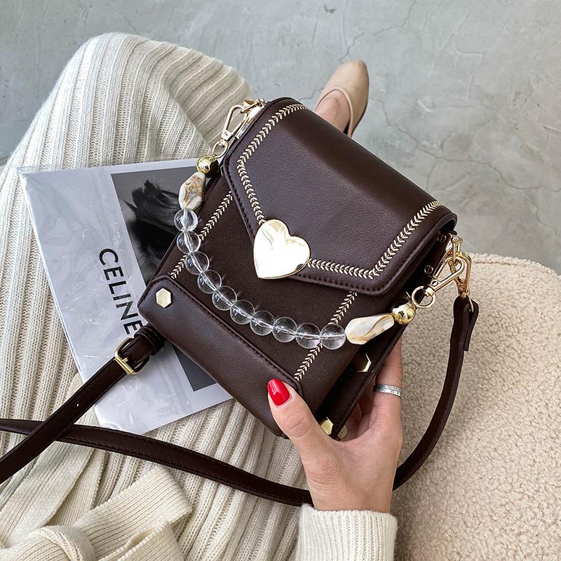 NEW Unique Bag Design Retro Rivet Square Bag Box Handbag & Elegant Shoulder Messenger Width 18.5cm, Beige
NEW Unique Bag Design Retro Rivet Square Bag Box Handbag & Elegant Shoulder Messenger Width 18.5cm, Beige