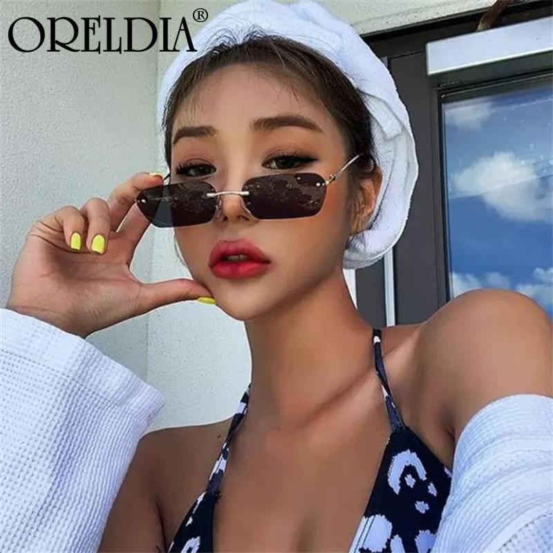 Fashion Rimless Sunglasses Women 220 Trendy Small Rectangle Sun Glasses Summer Traveling Style UV400 Gold Brown Shades for men
Fashion Rimless Sunglasses Women 220 Trendy Small Rectangle Sun Glasses Summer Traveling Style UV400 Gold Brown Shades for men