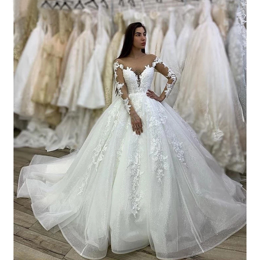 2021 New Princess Ball Bright Wedding Gown Sleeves Sheer Neck Apply Button Court Train Mariee Robe MVX6, White
2021 New Princess Ball Bright Wedding Gown Sleeves Sheer Neck Apply Button Court Train Mariee Robe MVX6, White