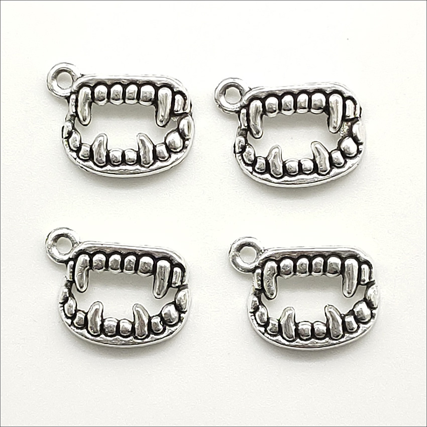 Lot 100pcs devil teeth Alloy Tibetan silver Charms Pendants Retro Jewelry Findings DIY Antique Silver Pendant For Bracelet Earrings 17*13mm
Lot 100pcs devil teeth Alloy Tibetan silver Charms Pendants Retro Jewelry Findings DIY Antique Silver Pendant For Bracelet Earrings 17*13mm