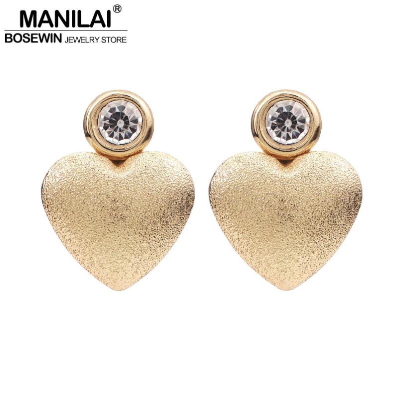 MANILAI Rough Surface Metal Heart Stud Earrings For Women Rhinestone Love Earrings Golden Silver Color Jewelry Wholesale
MANILAI Rough Surface Metal Heart Stud Earrings For Women Rhinestone Love Earrings Golden Silver Color Jewelry Wholesale