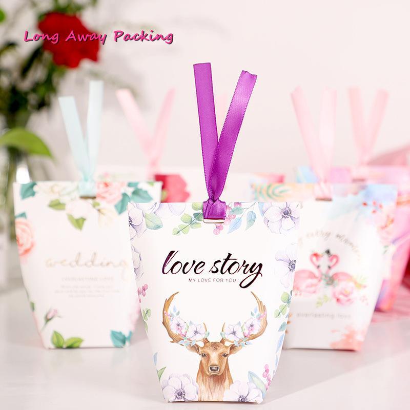 Flowers Priting Pillow Box for Chocolate Candy Cookie Wedding Party Baby Shower Packaging Boxes with Ribbon1
Flowers Priting Pillow Box for Chocolate Candy Cookie Wedding Party Baby Shower Packaging Boxes with Ribbon1