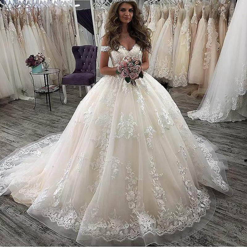 Off Shoulder Lace Ball Gown Wedding Dresses 2021 with Appliques Short Sleeves Court Train Tulle Plus Size Bridal Gowns