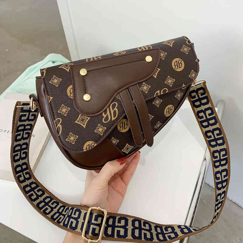 Bag women version net red saddle women's printed sling shoulder Pattern messenger bag, Old flower brown
Bag women version net red saddle women's printed sling shoulder Pattern messenger bag, Old flower brown