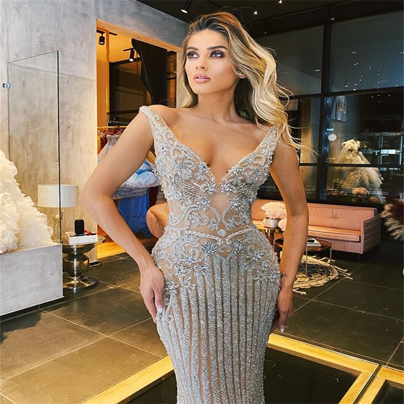 Luxury Prom Dresses Sexy V Neck Glitter Sequins Crystal Beads Ruffles Sheath Evening Dresses Sleeveless Illusion Sheer Party Dress