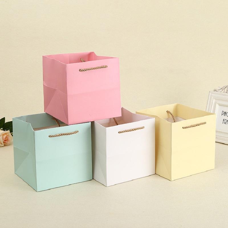 16x16x16cm 10pcs Large Square Blue Pink paper gift bag with handle cake flower packaging handle bag Wholesale
16x16x16cm 10pcs Large Square Blue Pink paper gift bag with handle cake flower packaging handle bag Wholesale