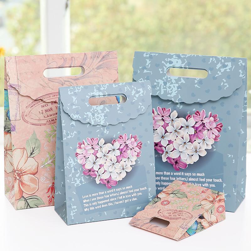 European Style Butterfly Flower Mask Bag Creative Gift Handbag Creative Paper Sack High-end Christmas Gift Packaging Bags 
European Style Butterfly Flower Mask Bag Creative Gift Handbag Creative Paper Sack High-end Christmas Gift Packaging Bags