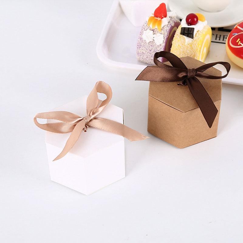 50Pcs/Lot Kraft Paper Hexagon Shape Gift Box With Silk Bowknot Display Decor Storage Candy Chocolate Box Party Supply
50Pcs/Lot Kraft Paper Hexagon Shape Gift Box With Silk Bowknot Display Decor Storage Candy Chocolate Box Party Supply