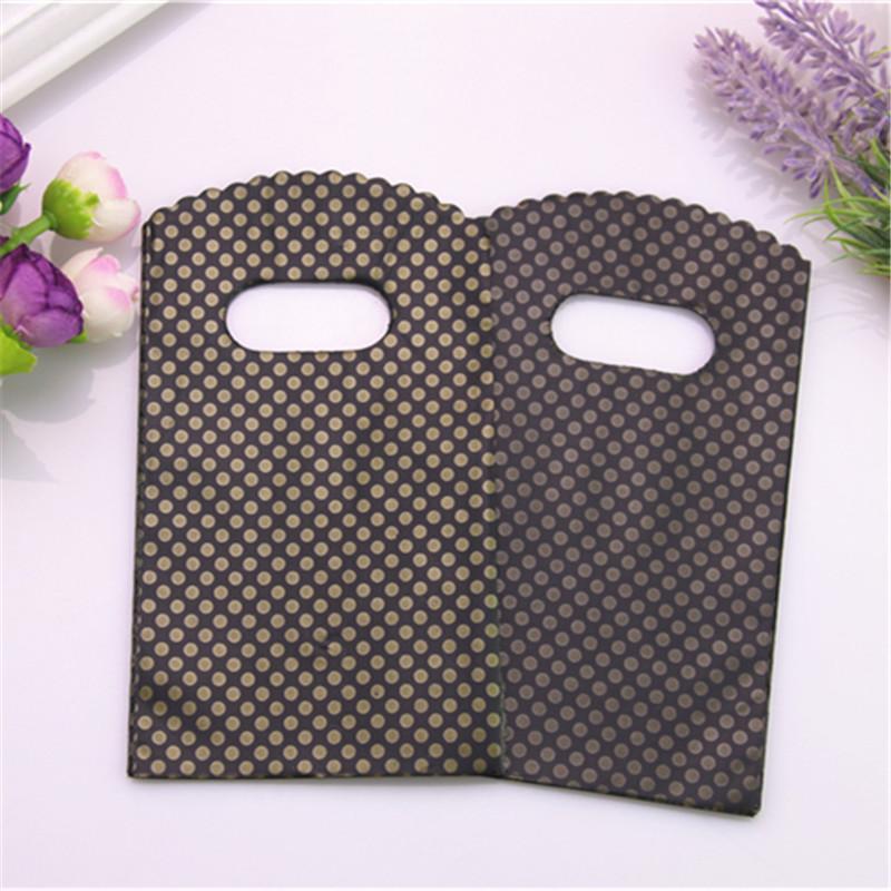 50pcs/pack Fashion 9*15cm Simple and Beautiful Black Small Gold Dot Mini Plastic Gift Bags With Handles candy bag
50pcs/pack Fashion 9*15cm Simple and Beautiful Black Small Gold Dot Mini Plastic Gift Bags With Handles candy bag