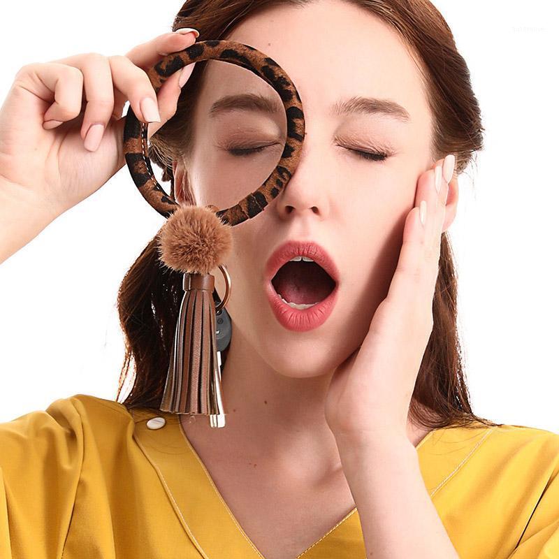 RE Classic Leopard Tassel Bracelet Keyring PU Leather Fur Ball Bracelet Keyring Pendant Women Fashon Keychain Jewelry1
RE Classic Leopard Tassel Bracelet Keyring PU Leather Fur Ball Bracelet Keyring Pendant Women Fashon Keychain Jewelry1