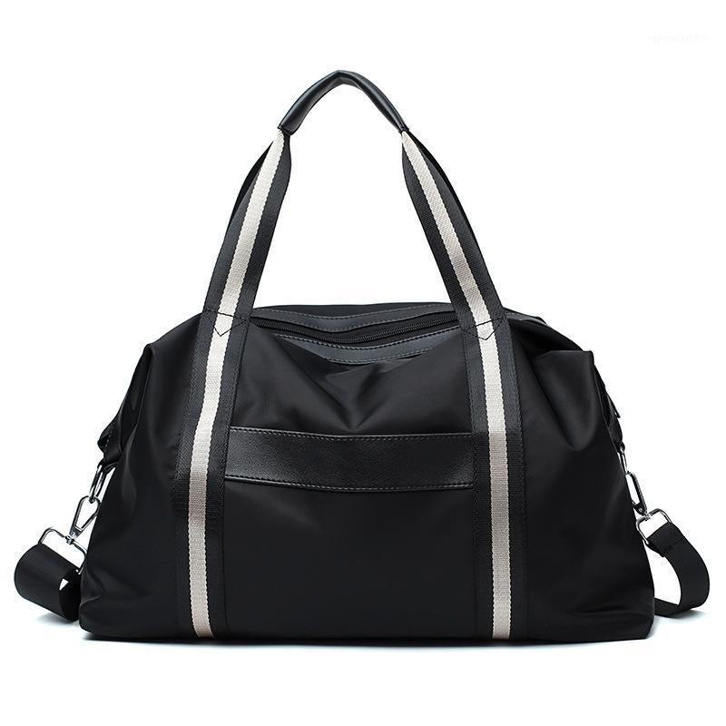 Hot Simple Oxford nylon waterproof bag large capacity travel bag Fitness sports travel casual Large-capacity handbag1
Hot Simple Oxford nylon waterproof bag large capacity travel bag Fitness sports travel casual Large-capacity handbag1