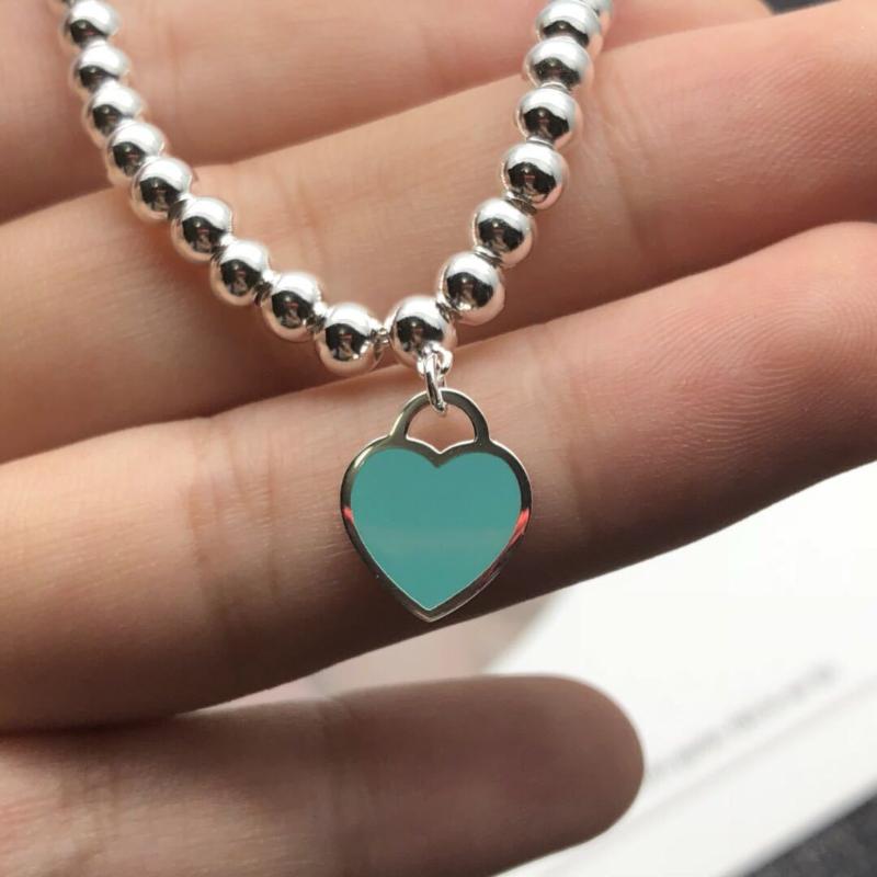 Titanium Steel Heart Bracelet For Women Stainless Steel Pink Blue Heart Pendant Snap Bracelets Charm Jewelry Woman 2020
Titanium Steel Heart Bracelet For Women Stainless Steel Pink Blue Heart Pendant Snap Bracelets Charm Jewelry Woman 2020