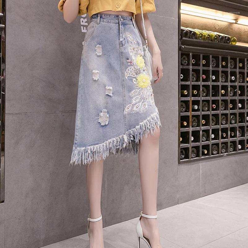 High street non-symmetrical ripped tassel A-line denim skirt women Fashion flower appliques high waist skirt 2020 midi1, Blue 1
High street non-symmetrical ripped tassel A-line denim skirt women Fashion flower appliques high waist skirt 2020 midi1, Blue 1