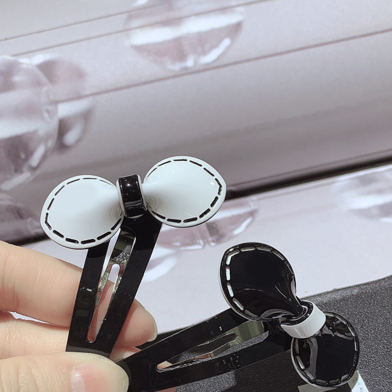 Fashion black and white acrylic bow hair clips edge clip hairpins popular head accessories in European and American countries