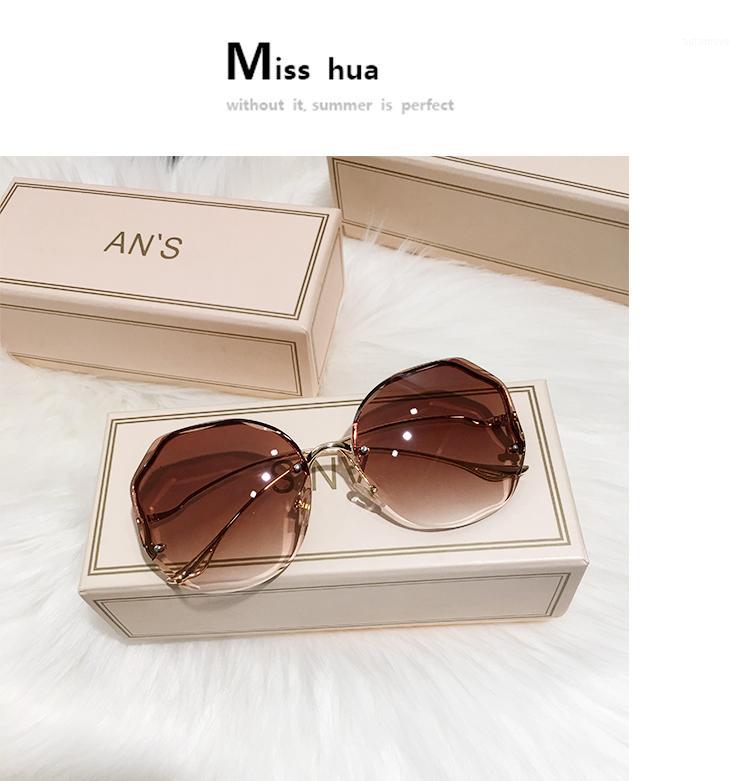 1005001425288125 New Sunglasses Rimless UV400 Brand Designer High Quality Gradient Sun Glasses Female oculos1 
1005001425288125 New Sunglasses Rimless UV400 Brand Designer High Quality Gradient Sun Glasses Female oculos1