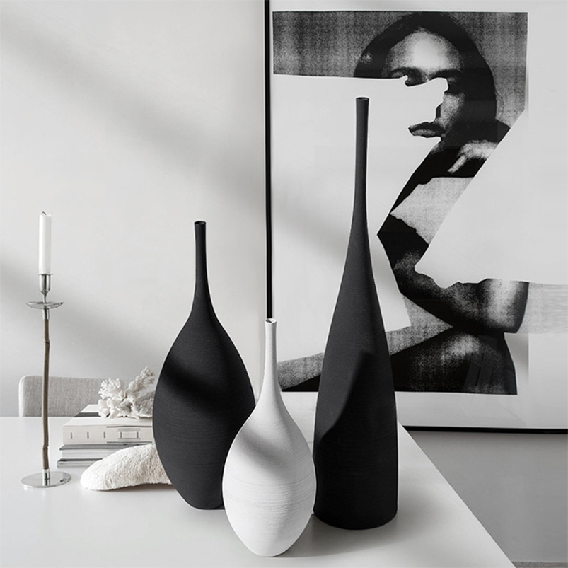 Ceramic Vase Black and White Simple Creative Design Handmade Art Decoration Living Room Model Room Vase Decoration Home Decore 211222
Ceramic Vase Black and White Simple Creative Design Handmade Art Decoration Living Room Model Room Vase Decoration Home Decore 211222