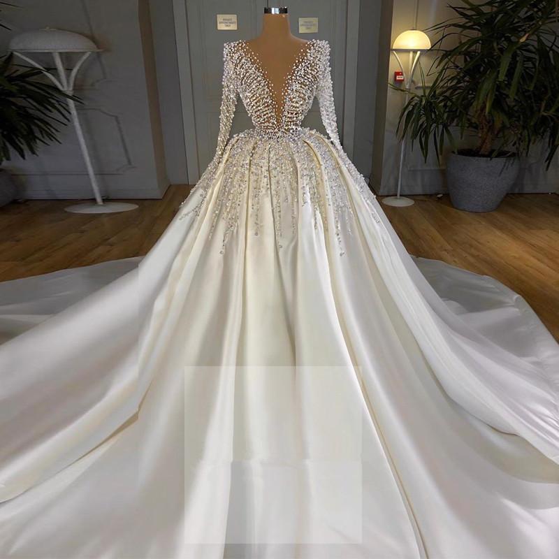 Dubai Long Sleeve Ball Gown Wedding Dresses Newest Sexy V Neck Pearls Beaded Satin Bridal Gowns Chapel Train Plus Size Vestido De Novia