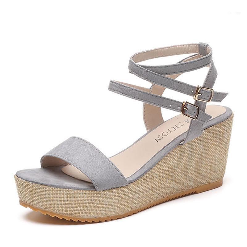 Foreign trade sandals female 2020 summer new slope with thick bottom toe women's shoes with a buckle buckle Roman high heel sand1
Foreign trade sandals female 2020 summer new slope with thick bottom toe women's shoes with a buckle buckle Roman high heel sand1