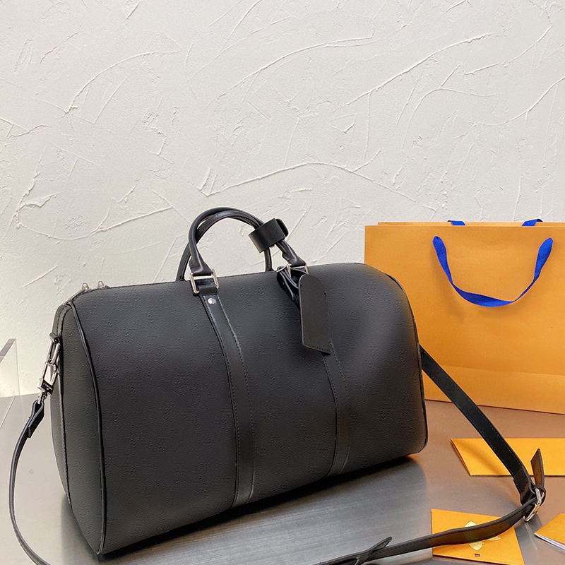 Top Quality Men Fashion Duffle Bag genuine leather Travel Bags Mens Handle Luggage Gentleman Business Totes with Shoulder Strap Praise and Explosion
Top Quality Men Fashion Duffle Bag genuine leather Travel Bags Mens Handle Luggage Gentleman Business Totes with Shoulder Strap Praise and Explosion