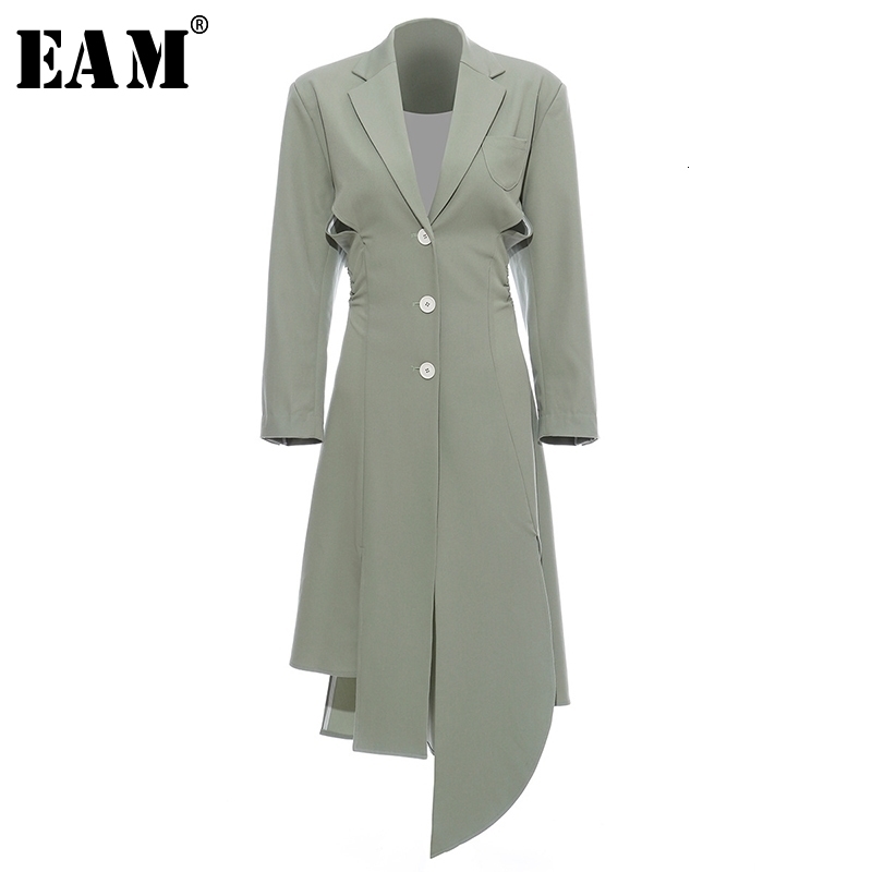 [EAM] Women Asymmetrical Hollow Out Long Trench New Lapel Long Sleeve Loose Fit Windbreaker Fashion Spring Autumn LJ201128