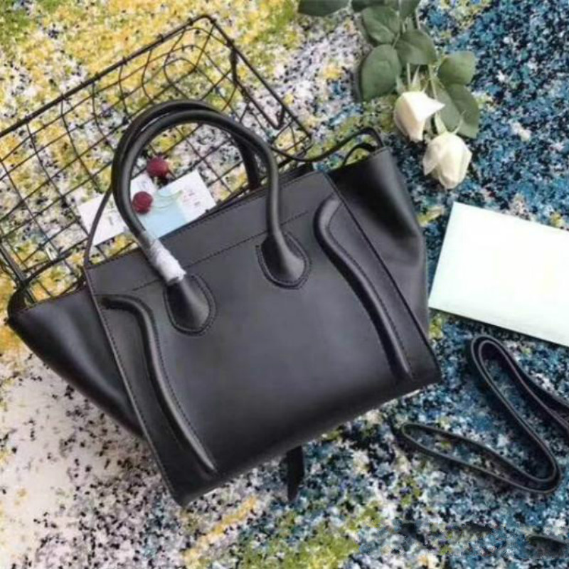 Top luxury Ladies Trapeze Casual Tote Handbag Real Cowhide Leather woman Designer Shoulder Bat Bag With Wrist Purse Bag Boston Handbags
Top luxury Ladies Trapeze Casual Tote Handbag Real Cowhide Leather woman Designer Shoulder Bat Bag With Wrist Purse Bag Boston Handbags