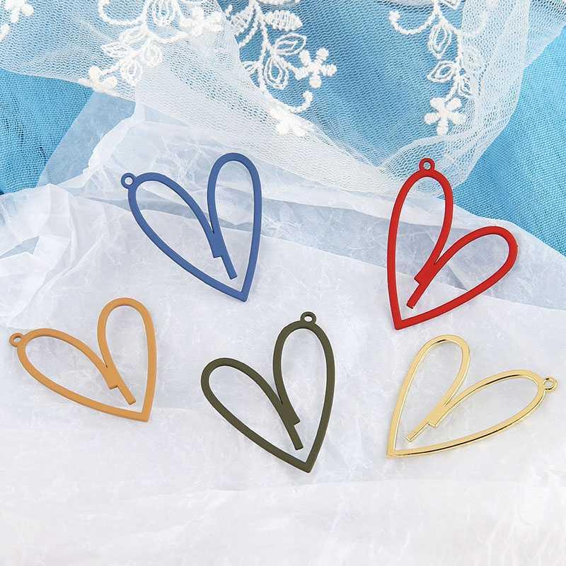 10Pcs Korean fashion alloy matte spray paint hollow heart statement earrings for women pendant material DIY jewelry accessories1
10Pcs Korean fashion alloy matte spray paint hollow heart statement earrings for women pendant material DIY jewelry accessories1