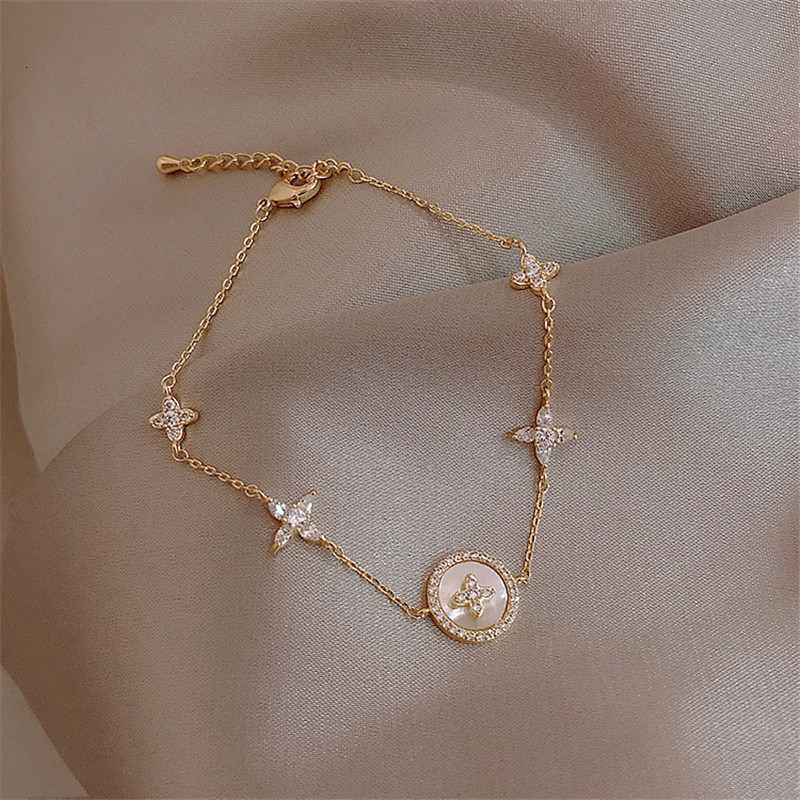 Luxury Fashion Cubic Zirconia Natural Shell Stone Charm for Woman Exquisite Gold Chain Cuff Bracelet Girl Jewelry Gift
Luxury Fashion Cubic Zirconia Natural Shell Stone Charm for Woman Exquisite Gold Chain Cuff Bracelet Girl Jewelry Gift