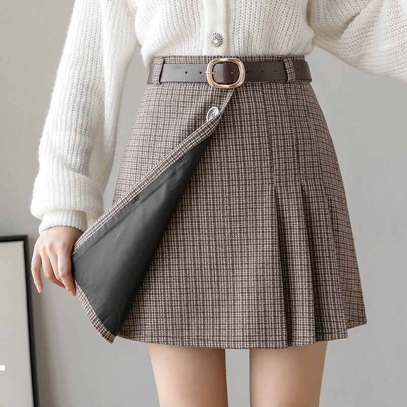 style 2021 New plaid high skirt autumn winter female wool skirts y351 FNPI, Heihuise.
style 2021 New plaid high skirt autumn winter female wool skirts y351 FNPI, Heihuise.