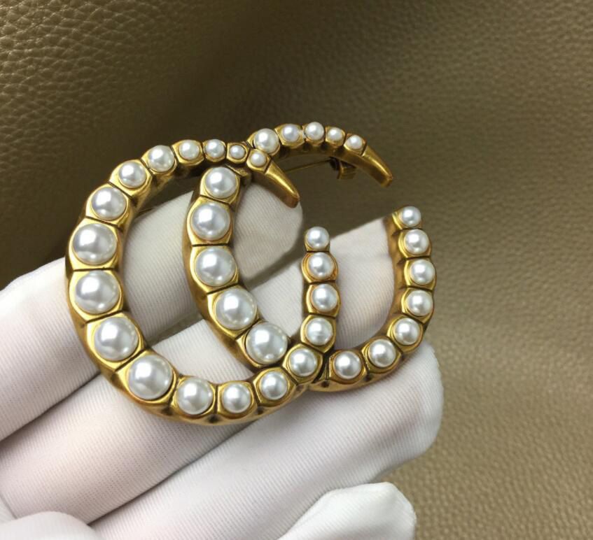 High quality charm lady designer brooches pins for fashion party jewelry gift
High quality charm lady designer brooches pins for fashion party jewelry gift