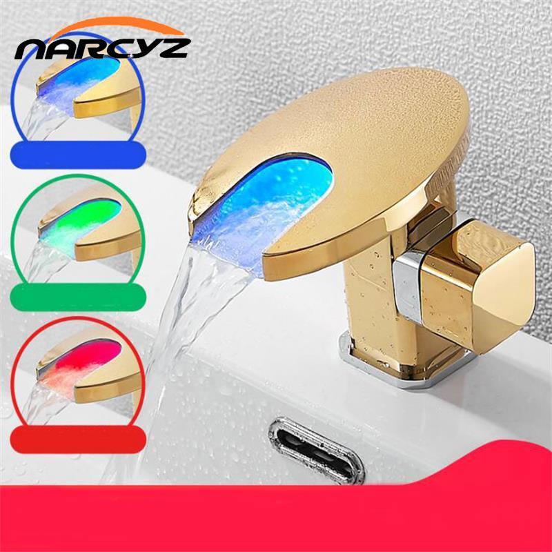 Basin Faucets LED Light Gold/White with Chrome Waterfall Basin Tap Torneira Deck Mounted Hot and Cold Sink Mixer Tap A15411
Basin Faucets LED Light Gold/White with Chrome Waterfall Basin Tap Torneira Deck Mounted Hot and Cold Sink Mixer Tap A15411