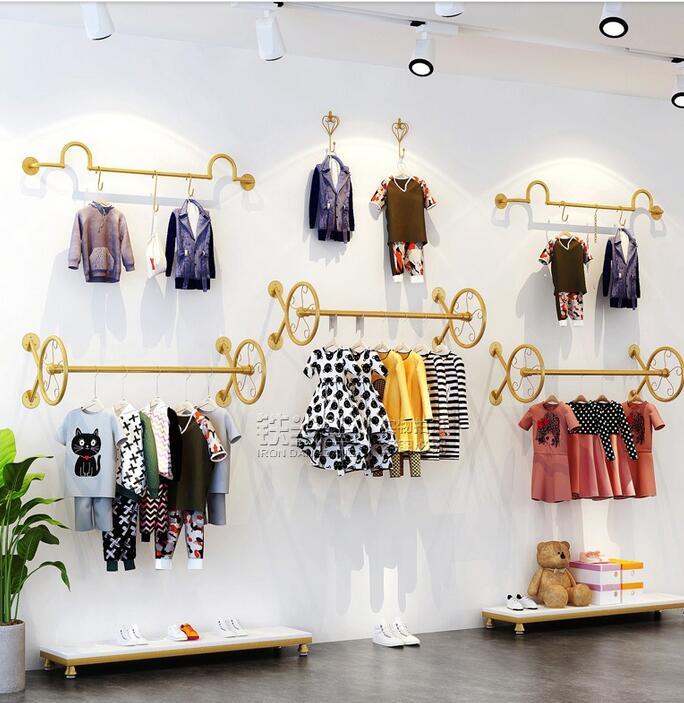 Children's wear display shelf wall personality wind wheel hanging clothes shelf clothing store wall hanging display
Children's wear display shelf wall personality wind wheel hanging clothes shelf clothing store wall hanging display