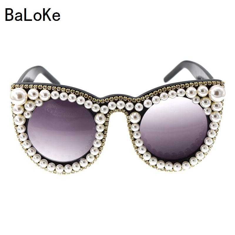 Fashion cool rhinestones cat eye sunglasses women brand designer oversize cat eye sunglasses pearl ladies party catEye glasses
Fashion cool rhinestones cat eye sunglasses women brand designer oversize cat eye sunglasses pearl ladies party catEye glasses