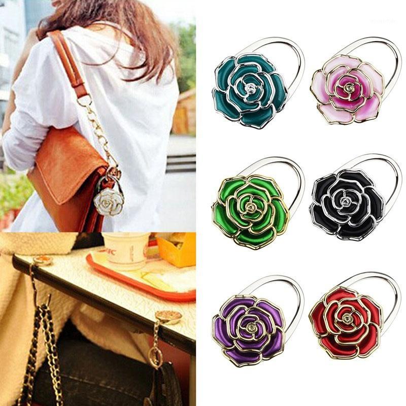 Flower Shaped Hanger Hook Hangers for Bag Hanging Holder Rose Table Office Floding Purse Handbag Umbrella1
Flower Shaped Hanger Hook Hangers for Bag Hanging Holder Rose Table Office Floding Purse Handbag Umbrella1