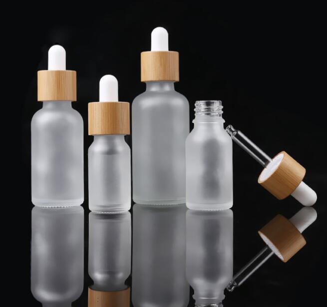 50ml 100ml frosted green blue clear glass dropper bottle bamboo wood top lid perfum e essential oil glass pipette bottle with bamboo cap
50ml 100ml frosted green blue clear glass dropper bottle bamboo wood top lid perfum e essential oil glass pipette bottle with bamboo cap