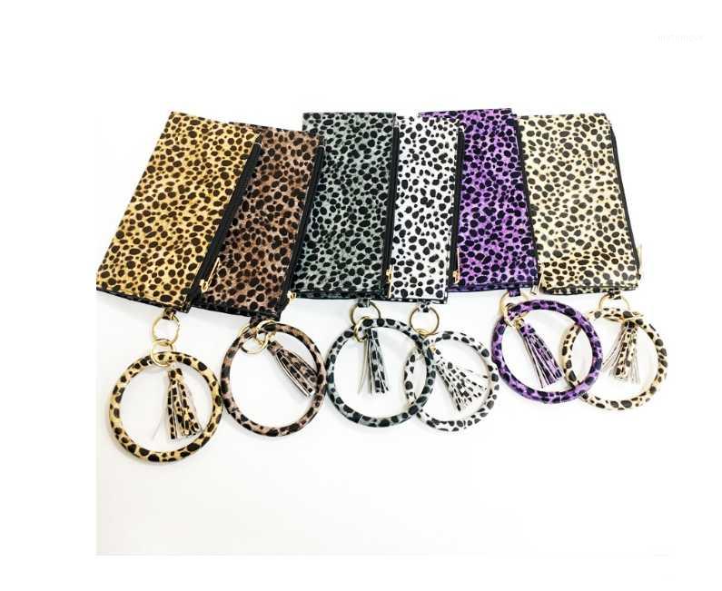 2020 Fashion PU Leather Flower Leopard Printed Phone Wallet O Keychain Creative Tassel Women Zero wallet Bracelet Key Chain Gift1
2020 Fashion PU Leather Flower Leopard Printed Phone Wallet O Keychain Creative Tassel Women Zero wallet Bracelet Key Chain Gift1