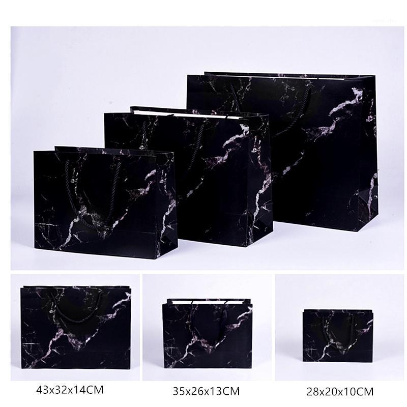 Ins fashion paper bag 100pcs custom made marble pattern gradient dog gift paper bag New Year party store packing1
Ins fashion paper bag 100pcs custom made marble pattern gradient dog gift paper bag New Year party store packing1
