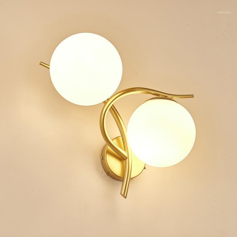 Modern Nordic Gold/black led bedroom bedside glass Wall Light Creative minimalist living room wall lamp Hotel bedside lamp1
Modern Nordic Gold/black led bedroom bedside glass Wall Light Creative minimalist living room wall lamp Hotel bedside lamp1