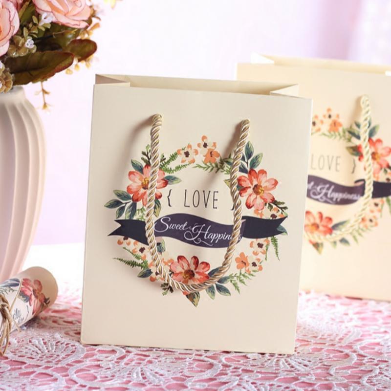 20pcs Floral Wreath Garland Paper Bags Wedding Favors Candy Boxes Hand Bags Shopping Makeup Party Gift Bags, 18x15x9cm1
20pcs Floral Wreath Garland Paper Bags Wedding Favors Candy Boxes Hand Bags Shopping Makeup Party Gift Bags, 18x15x9cm1