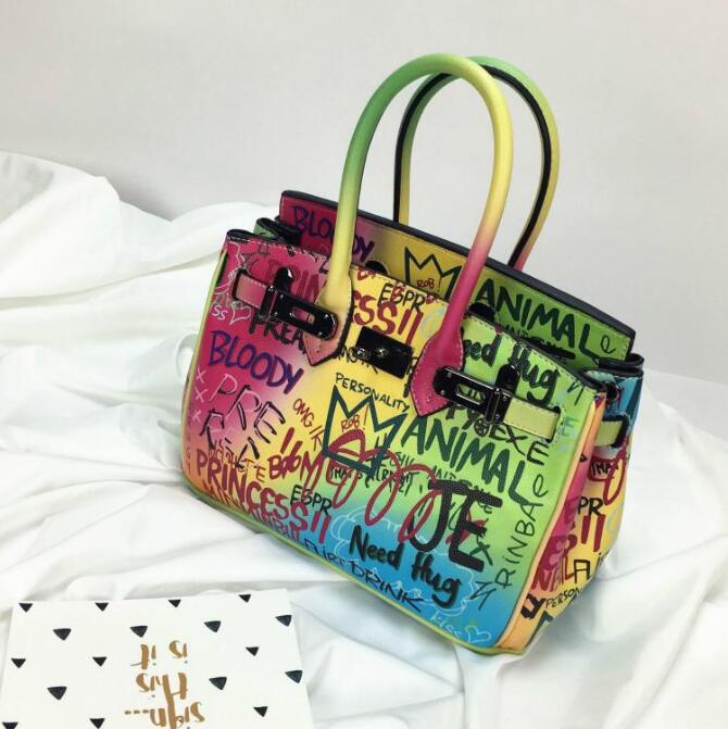 Ladies Ins Fashion Handbag Women 2020 New Luxury Rainbow Color Graffiti Platinum Bag Girl Pu Leather Wild Messenger Bag
Ladies Ins Fashion Handbag Women 2020 New Luxury Rainbow Color Graffiti Platinum Bag Girl Pu Leather Wild Messenger Bag