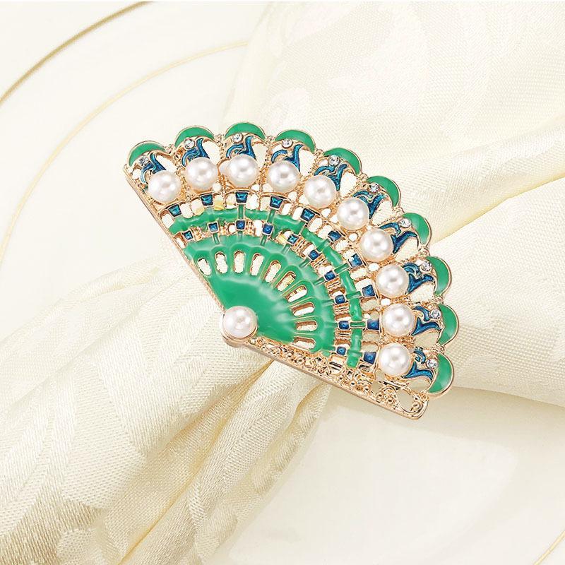 100pcs/lot New napkin ring pearl fan-shaped napkin buckle diamond alloy western ring mat towel1
100pcs/lot New napkin ring pearl fan-shaped napkin buckle diamond alloy western ring mat towel1