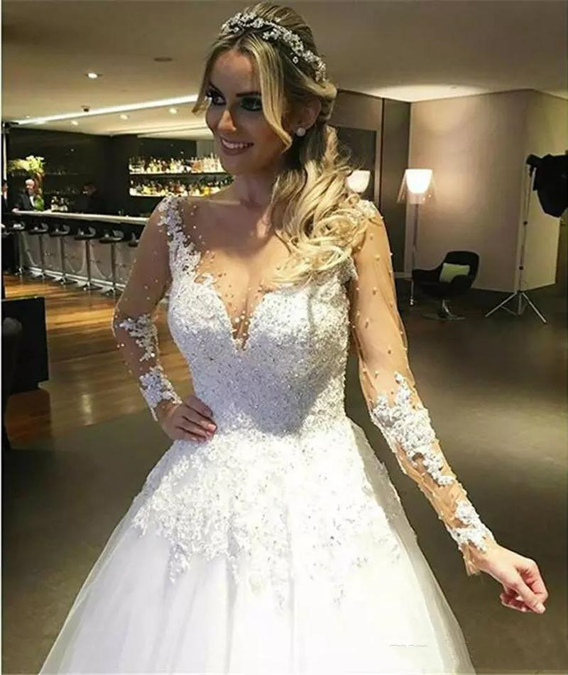 2022 Exquisite Long Sleeves A Line Wedding Dresses Bridal Gowns Sexy Sheer Back Buttons Appliques Lace Pearls Beaded Spring Tulle Garden Bride Dress P