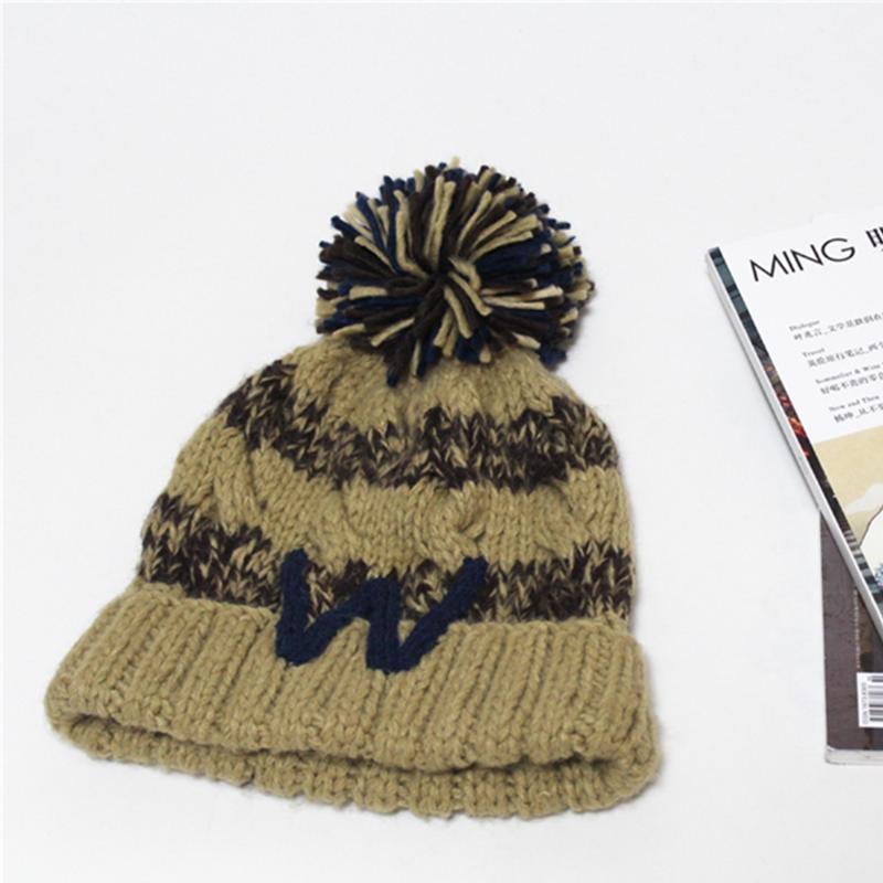 Wholesale autumn and winter men and women hand-made wool hat letter striped knitted hat ball ear protector ball cap1
Wholesale autumn and winter men and women hand-made wool hat letter striped knitted hat ball ear protector ball cap1