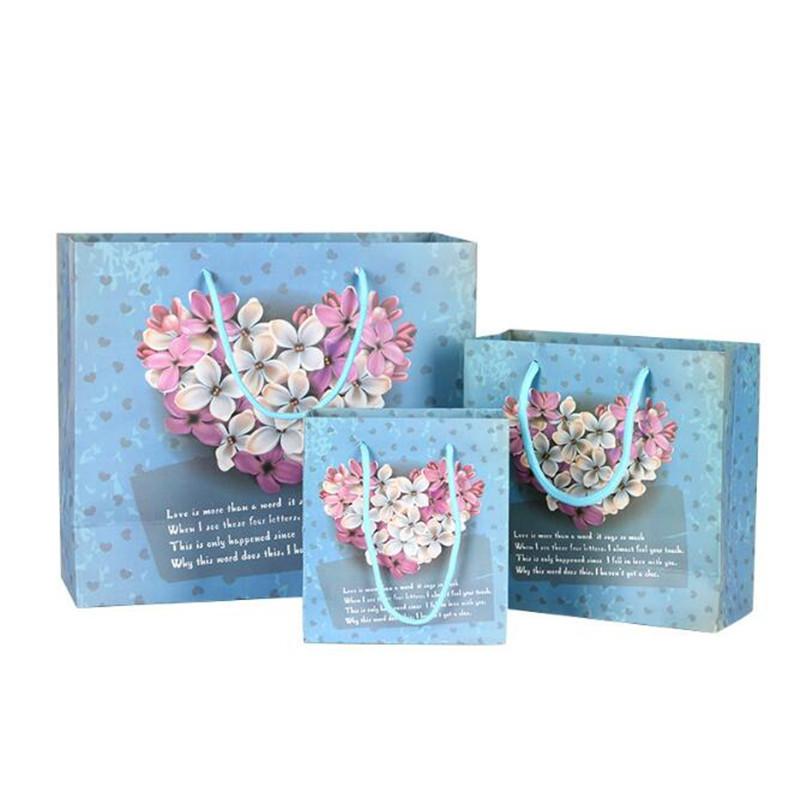 20pcs/lot Natural paper bag with handle Wedding Party Favor Paper Gift Bags 
20pcs/lot Natural paper bag with handle Wedding Party Favor Paper Gift Bags