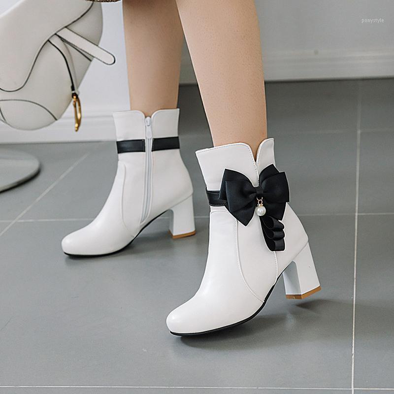 Party style comfortable round toe ankle boots fashion color matching bow zipper white pink black thick high heel riding boots1
Party style comfortable round toe ankle boots fashion color matching bow zipper white pink black thick high heel riding boots1