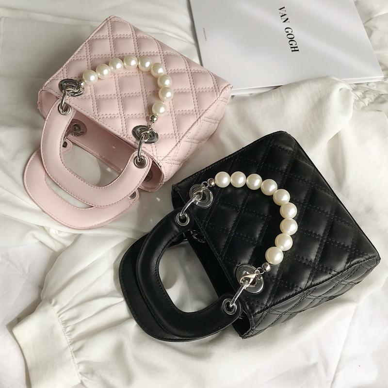 Tote bag 2021 Fashion New High Quality PU Leather Women's Designer Handbag Pearl Portable Shoulder Messenger Bags, Black 
Tote bag 2021 Fashion New High Quality PU Leather Women's Designer Handbag Pearl Portable Shoulder Messenger Bags, Black