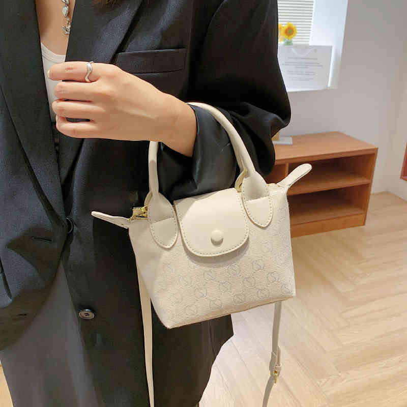 sling shoulder pattern small winter new splicing ear bag, White
sling shoulder pattern small winter new splicing ear bag, White