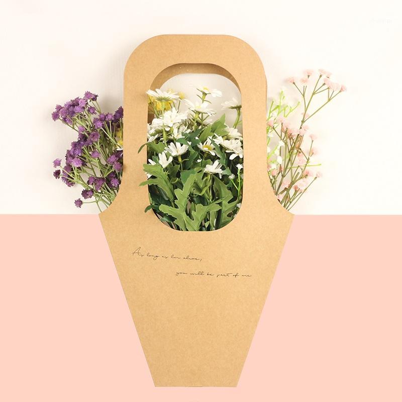 5PCS kraft paper portable bouquet bag flower bouquet packaging paper bag simple portable kraft1
5PCS kraft paper portable bouquet bag flower bouquet packaging paper bag simple portable kraft1